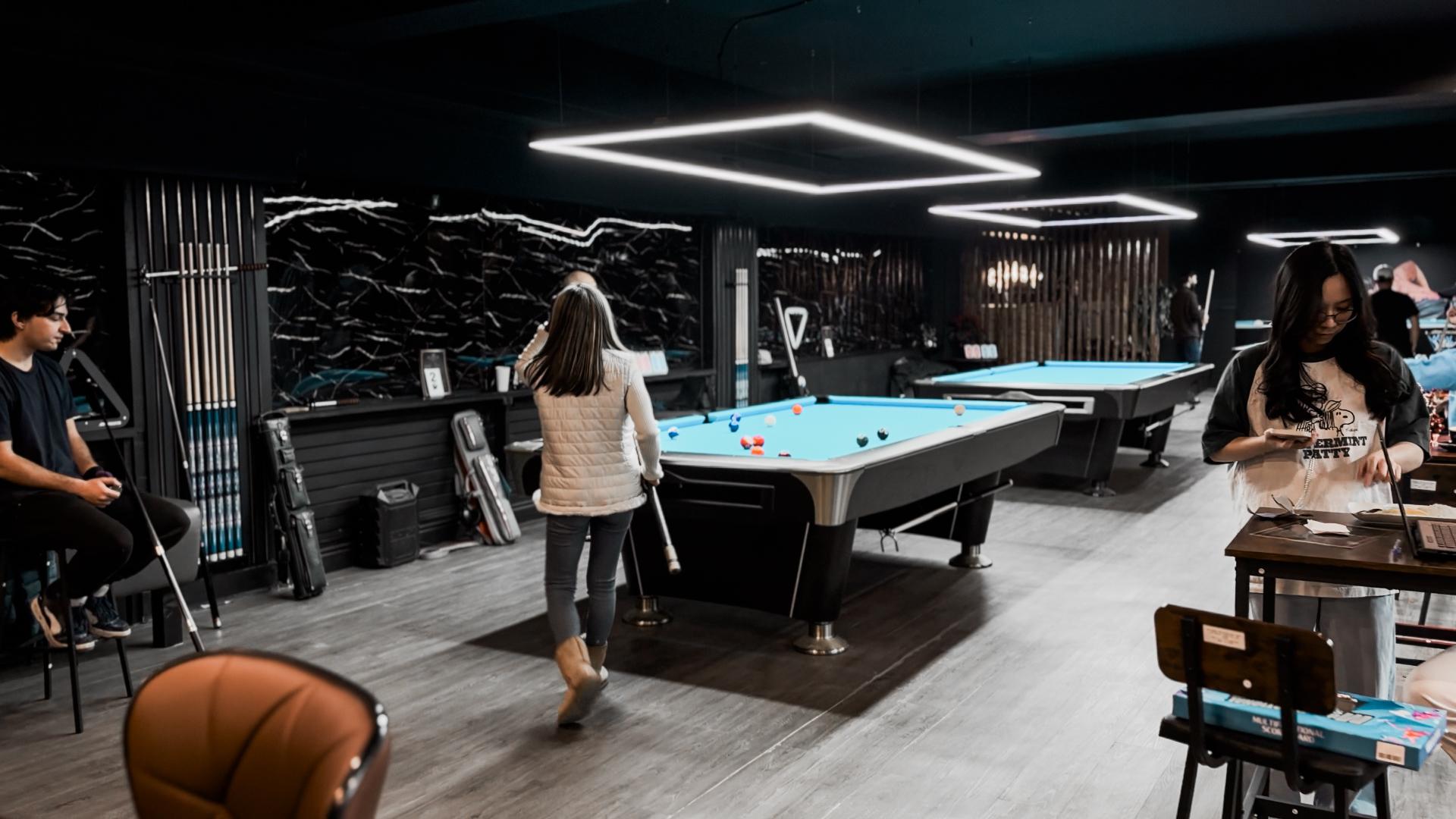 Pool Academy interior — warm ambient lighting