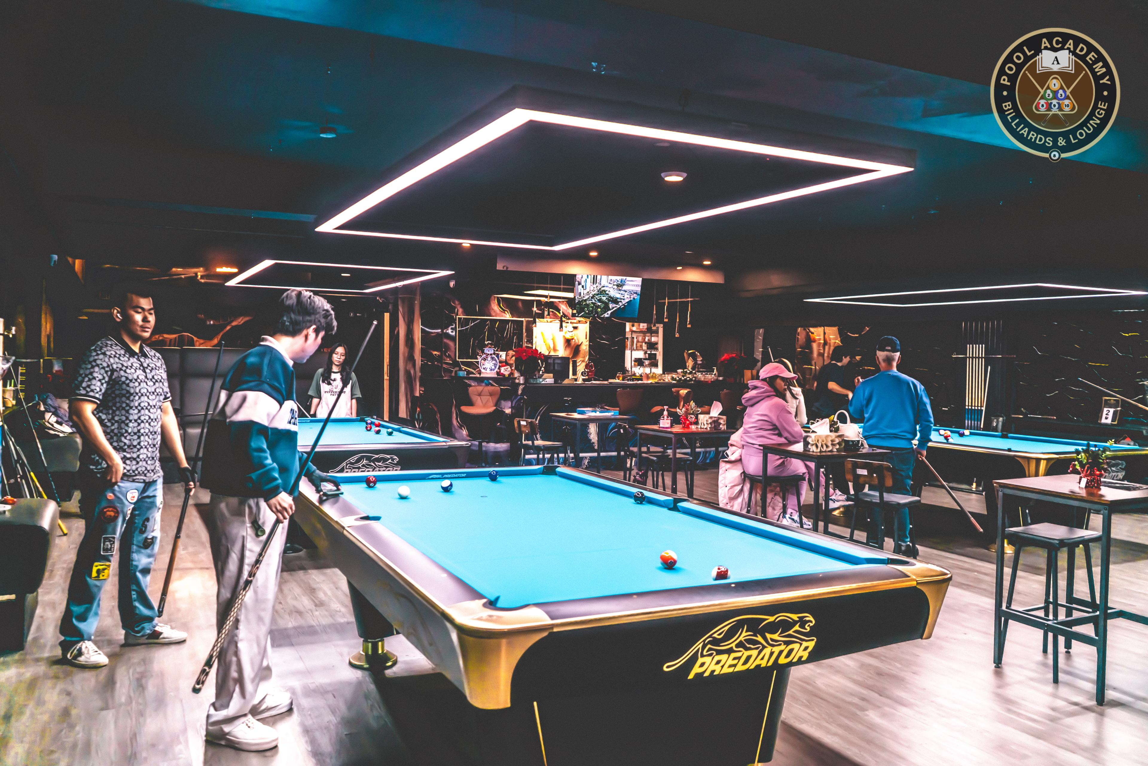 Players competing in Pool Academy tournament